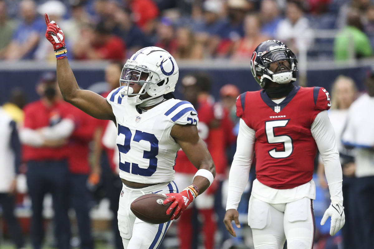 Dec 5, 2021; Houston, Texas, USA; Indianapolis Colts cornerback Kenny Moore II (23) gestures to his coach to throw a challenge flag after he intercepted the ball against Houston Texans quarterback Tyrod Taylor (5) in the first quarter at NRG Stadium. Mandatory Credit: Thomas Shea-USA TODAY Sports