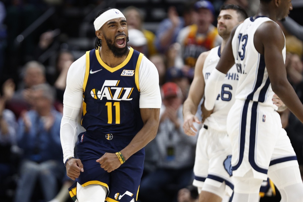 Utah Jazz guard Mike Conley (11) celebrates in the second half against the Memphis Grizzlies at Vivint Arena.