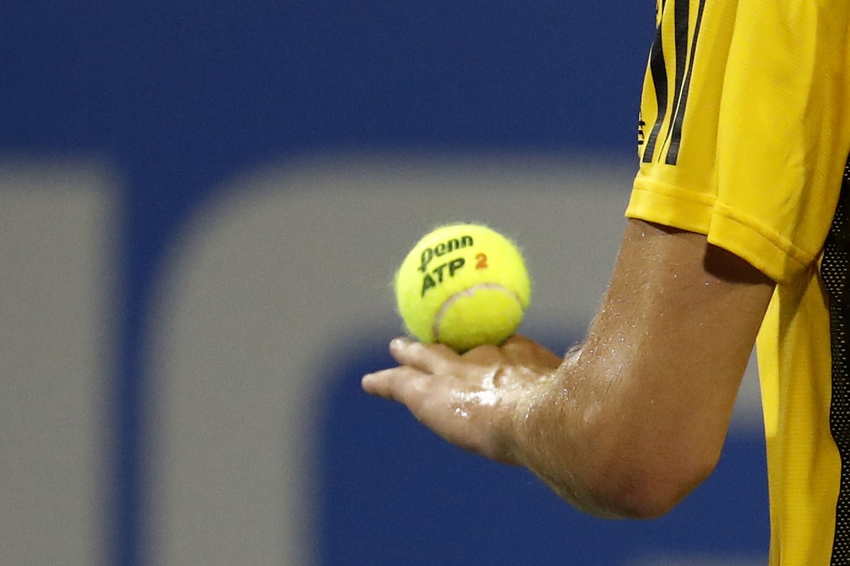 Aug 1, 2017; Washington, DC, USA; Dominic Thiem of Austria balances a ball on his hand prior to serving against Henri Laaksonen of Switzerland (not pictured) on day two of the Citi Open at Fitzgerald Tennis Center. Thiem won 6-3, 6-3. Mandatory Credit: Geoff Burke-USA TODAY Sports