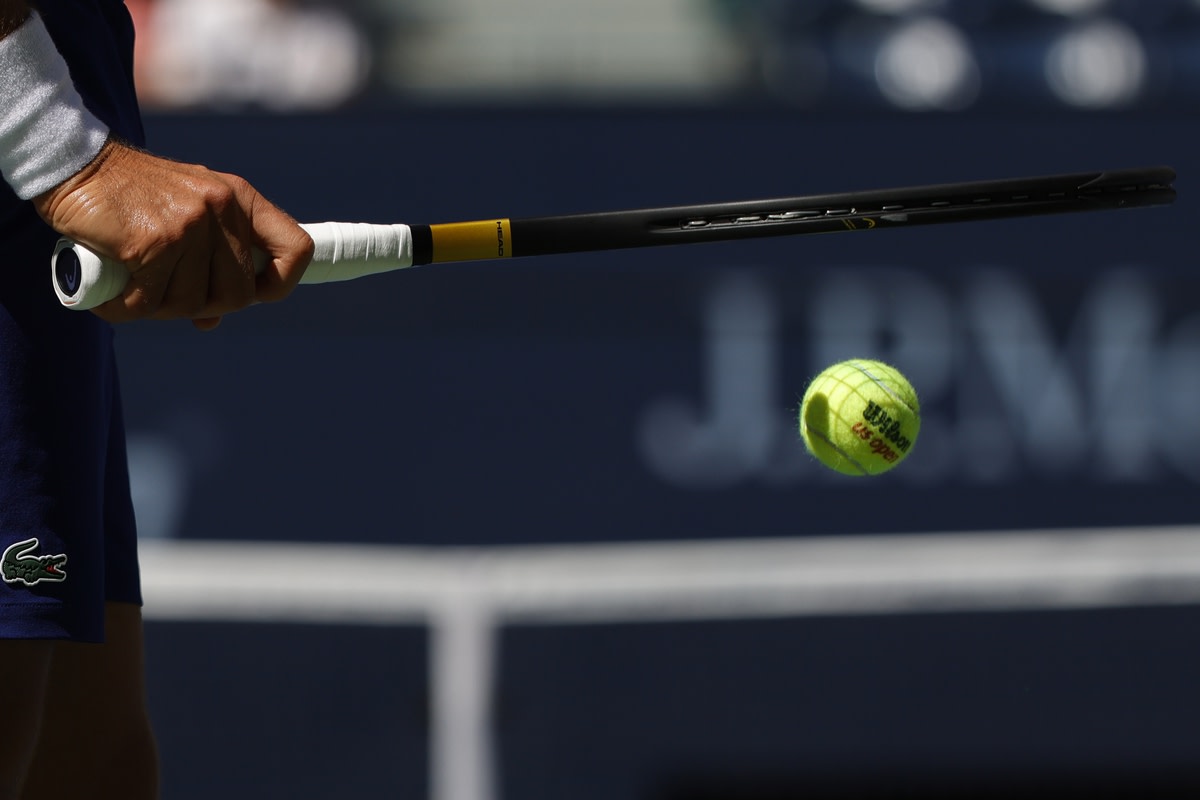 Sep 4, 2021; Flushing, NY, USA; Novak Djokovic of Serbia bounces a ball prior to serving against Kei Nishikori of Japan (not pictured) on day six of the 2021 U.S. Open tennis tournament at USTA Billie Jean King National Tennis Center. Mandatory Credit: Geoff Burke-USA TODAY Sports