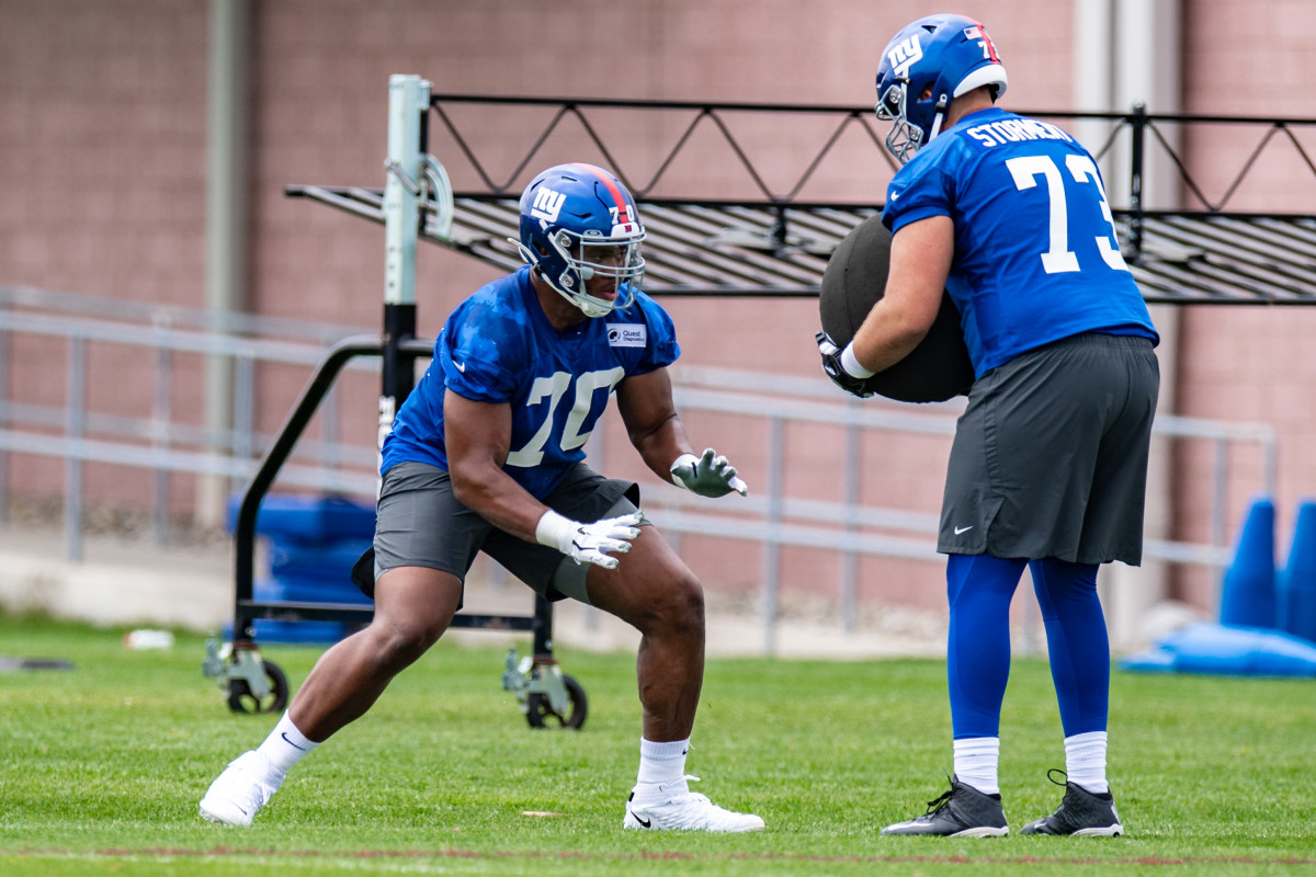 Evan Neal takes part in the New York Giants' mini camp