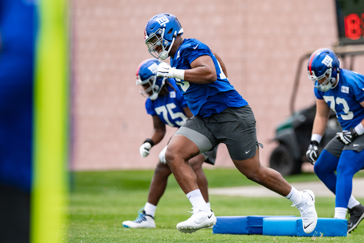 Evan Neal takes part in the New York Giants' mini camp