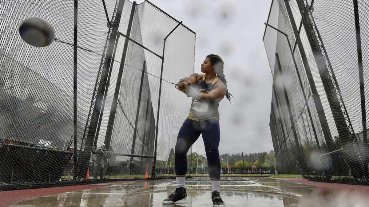Camryn Rogers in the rain at Eugene