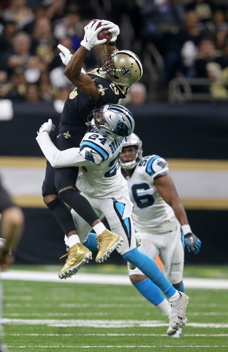 New Orleans Saints wide receiver Michael Thomas (13) makes a catch against the Carolina Panthers. Mandatory Credit: Chuck Cook-USA TODAY Sports
