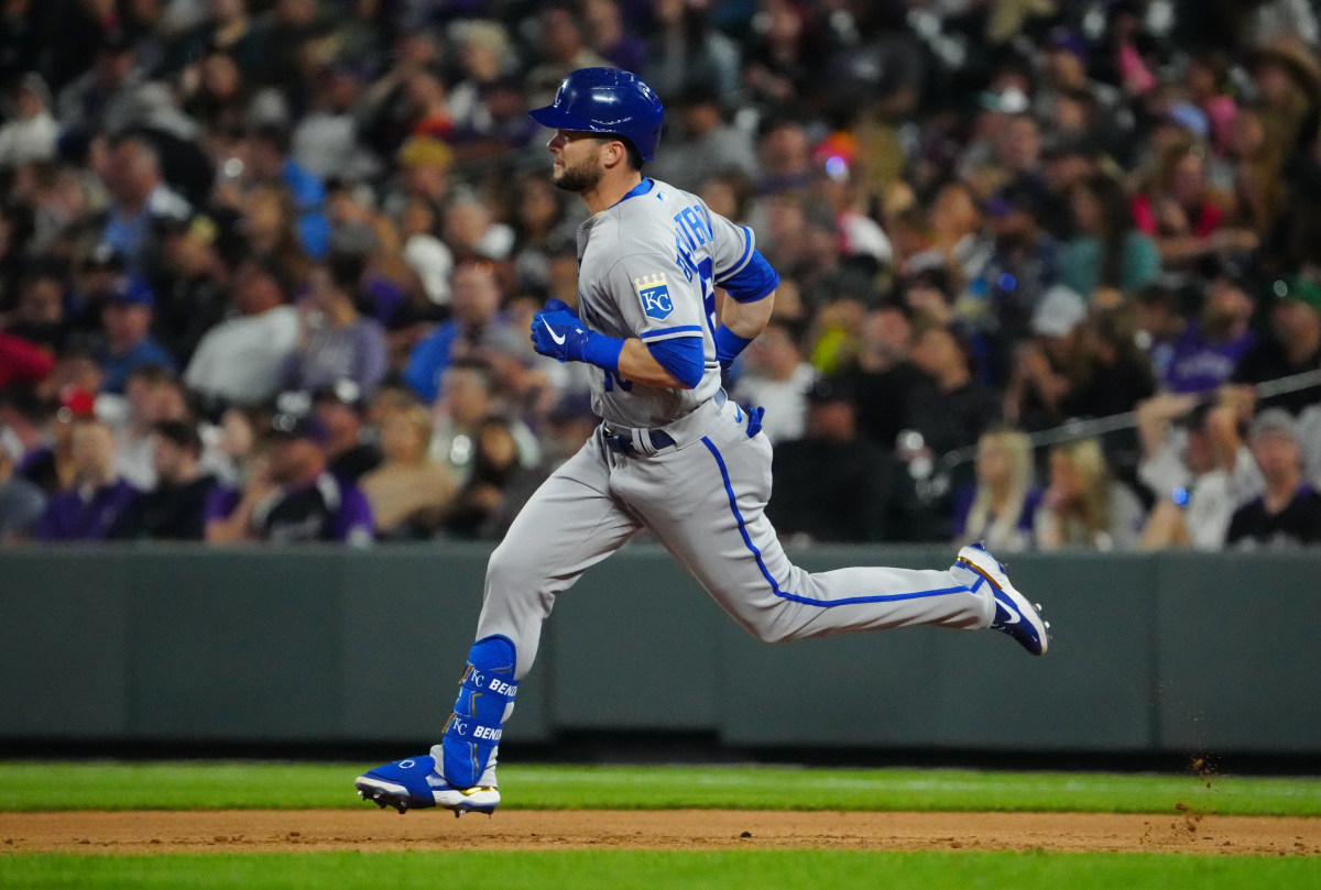 May 13, 2022; Denver, Colorado, USA; Kansas City Royals left fielder Andrew Benintendi (16) RBI triples in the seventh inning against the Colorado Rockies at Coors Field. Mandatory Credit: Ron Chenoy-USA TODAY Sports