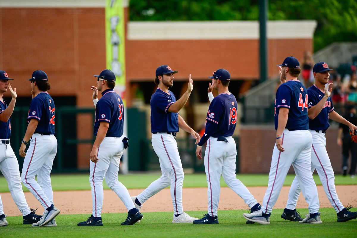 Auburn baseball celebrates a series win over Alabama.