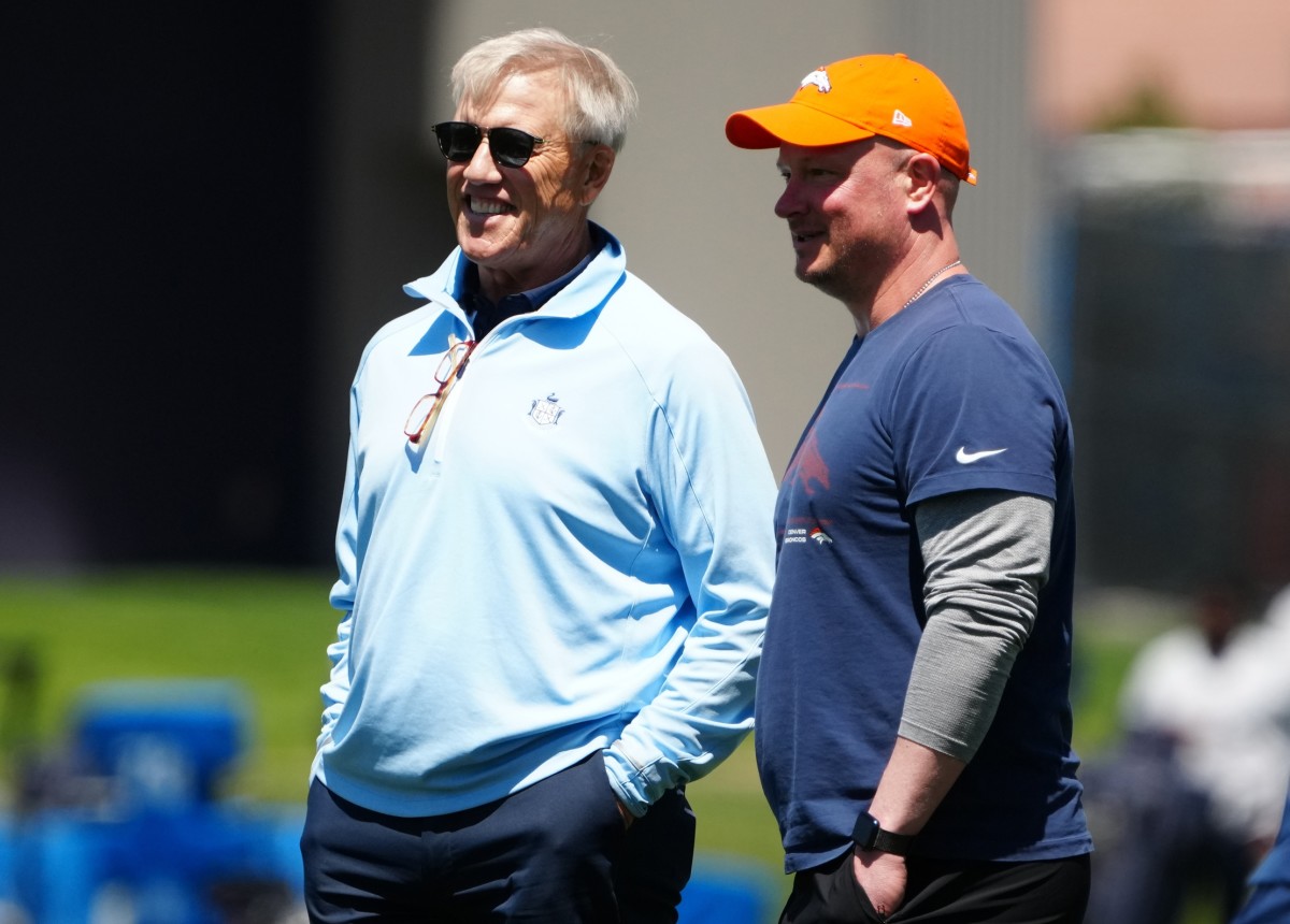 Denver Bronco President of Football Operations John Elway (left) and head coach Nathaniel Hackett (right) during rookie mini camp drills at UCHealth Training Center.