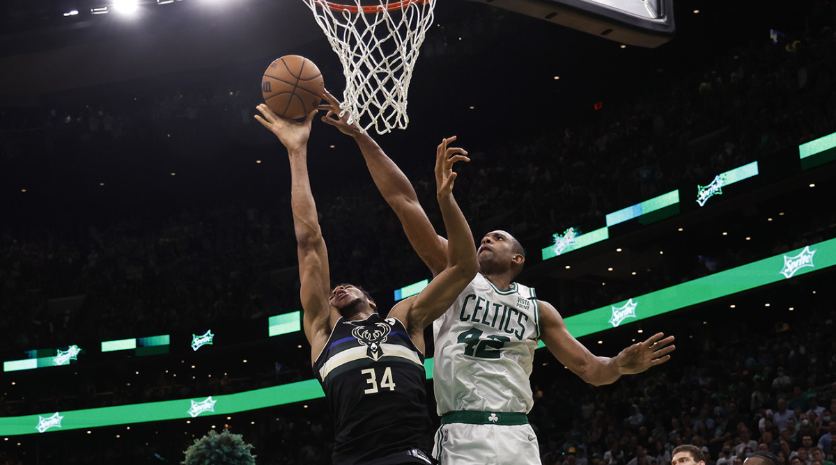 Celtics center Al Horford (42) blocks a shot by Bucks forward Giannis Antetokounmpo (34) during the second half of Game 7 of the second round of the 2022 NBA playoffs at TD Garden