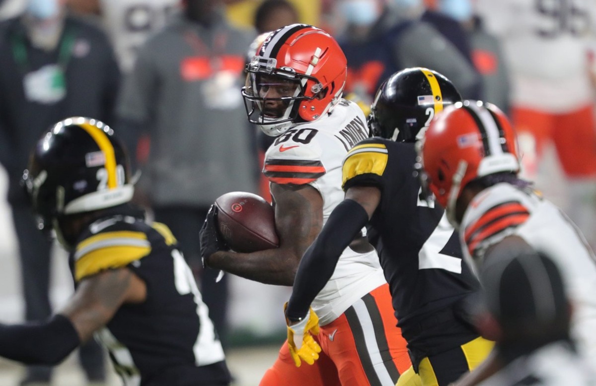 Cleveland Browns wide receiver Jarvis Landry (80) eyes down Pittsburgh defenders as runs toward the end zone to score during the second half of an NFL wild-card playoff football game, Sunday, Jan. 10, 2021, in Pittsburgh, Pennsylvania. [Jeff Lange/Beacon Journal] Browns Extras 21