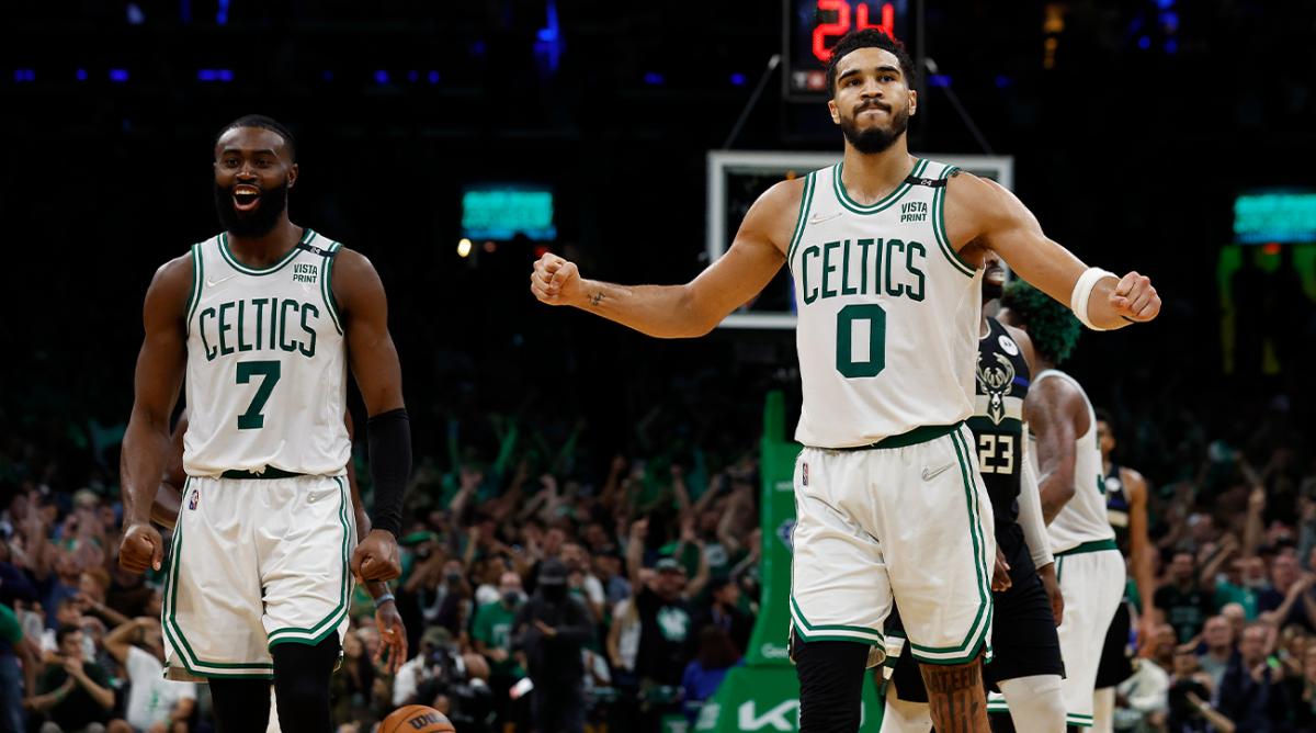 May 15, 2022; Boston, Massachusetts, USA; Boston Celtics guard Jaylen Brown (7) and forward Jayson Tatum (0) celebrate during the second half of their win over the Milwaukee Bucks in game seven of the second round of the 2022 NBA playoffs at TD Garden.