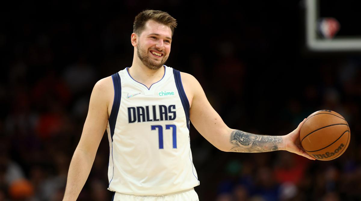 May 15, 2022; Phoenix, Arizona, USA; Dallas Mavericks guard Luka Doncic (77) reacts against the Phoenix Suns in game seven of the second round for the 2022 NBA playoffs at Footprint Center.