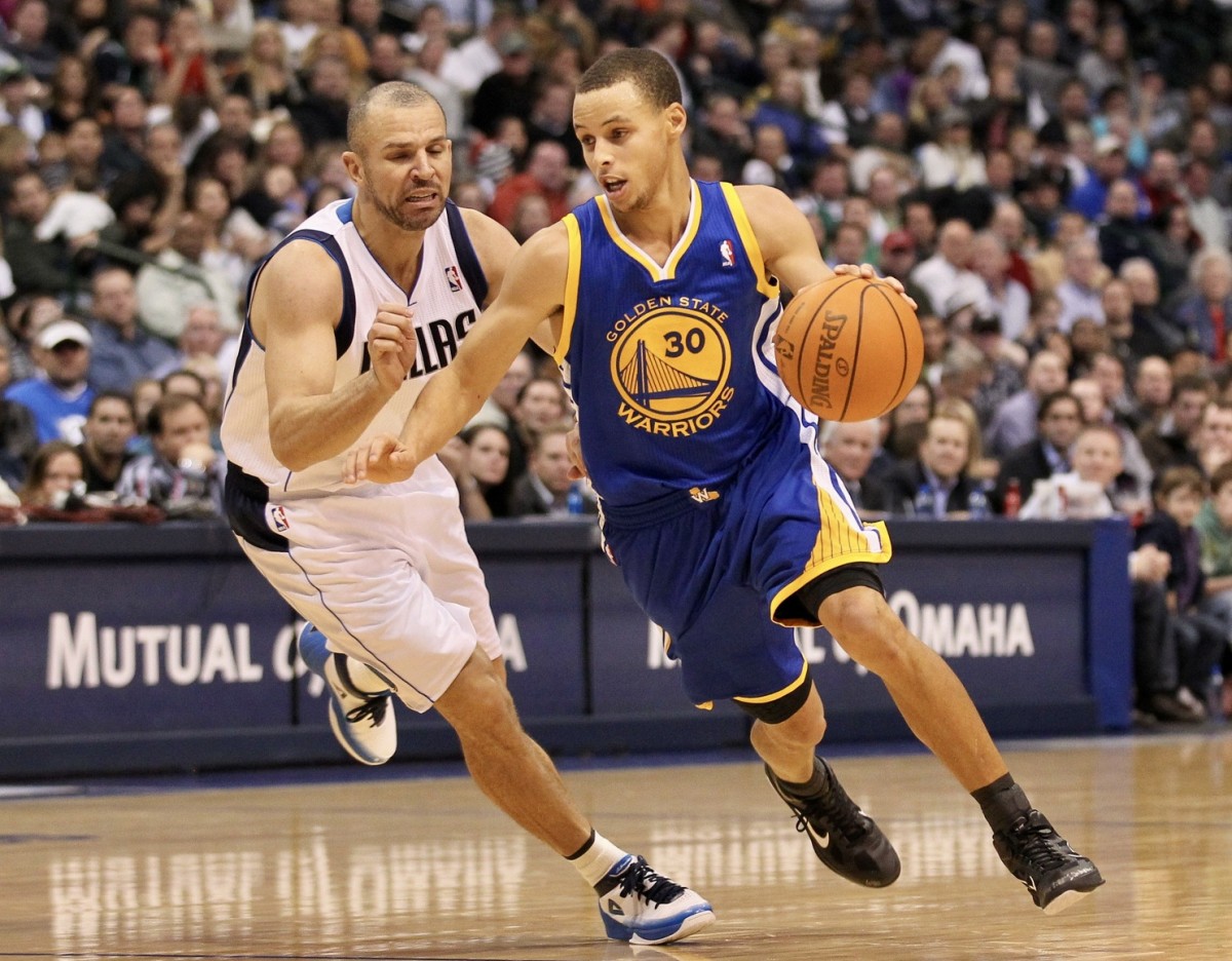 Jason Kidd defends a young Stephen Curry