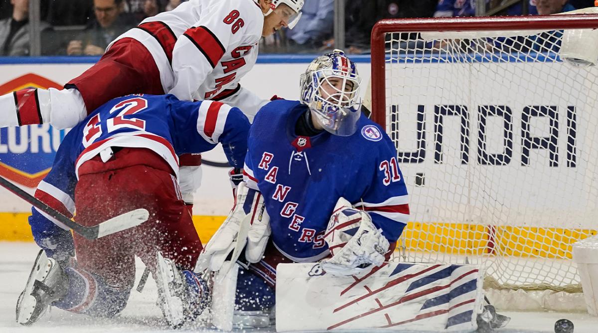 Carolina Hurricanes left wing Teuvo Teravainen (86) scores on New York Rangers goaltender Igor Shesterkin (31) during the second period of an NHL hockey game, Tuesday, April 26, 2022, in New York.
