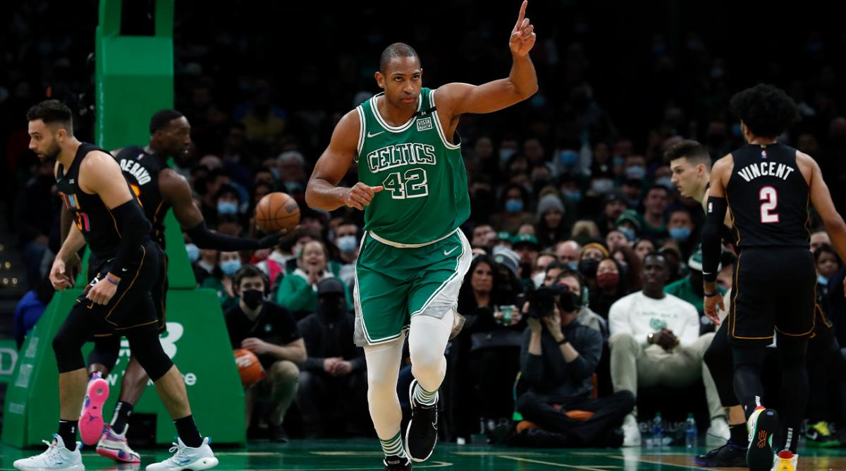Jan 31, 2022; Boston, Massachusetts, USA; Boston Celtics center Al Horford (42) points to a teammate after a basket against the Miami Heat during the first quarter at TD Garden.