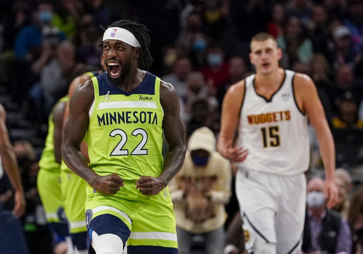 Minnesota Timberwolves guard Patrick Beverley (22) reacts after a basket by forward Anthony Edwards (not pictured) against the Denver Nuggets during the second quarter at Target Center.