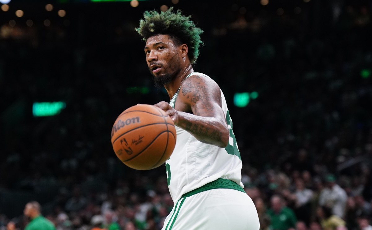 Boston Celtics guard Marcus Smart (36) returns the ball against the Milwaukee Bucks in the second half during game five of the second round for the 2022 NBA playoffs at TD Garden.