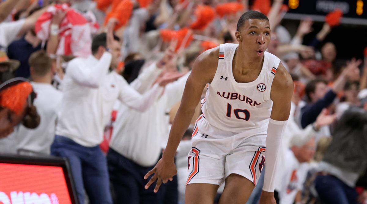 FILE - Auburn forward Jabari Smith (10) reacts after making a 3-pointer against Alabama during the first half of an NCAA college basketball game Tuesday, Feb. 1, 2022, in Auburn, Ala. Houston, Detroit and Orlando share the best odds to win the draft lottery on Tuesday, May 17, 2022, and the No. 1 pick in the NBA draft. All three are already loaded with young players, even before the possibility of adding someone like Chet Holmgren, Paolo Banchero or Jabari Smith.