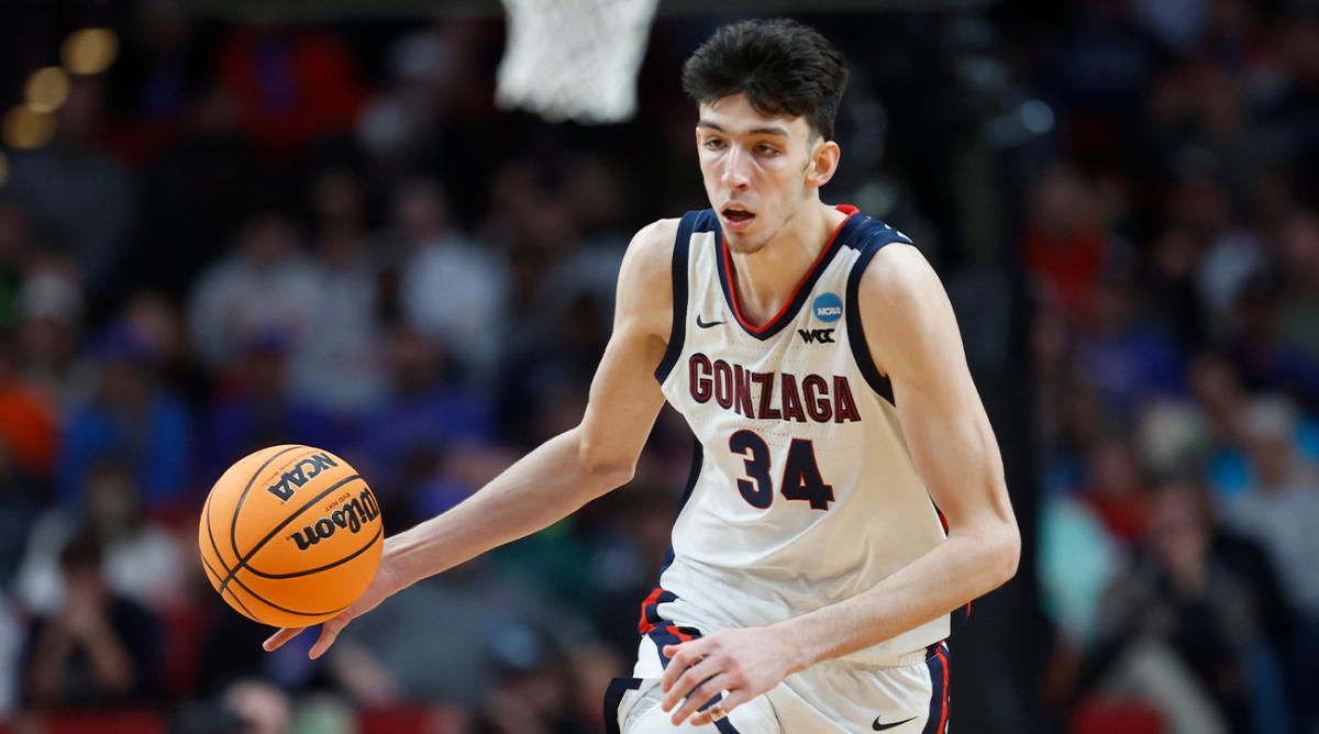 FILE - Gonzaga center Chet Holmgren (34) moves the ball against Georgia State during the second half of a first round NCAA college basketball tournament game, Thursday, March 17, 2022, in Portland, Ore. Houston, Detroit and Orlando share the best odds to win the draft lottery on Tuesday, May 17, 2022, and the No. 1 pick in the NBA draft. All three are already loaded with young players, even before the possibility of adding someone like Chet Holmgren, Paolo Banchero or Jabari Smith.