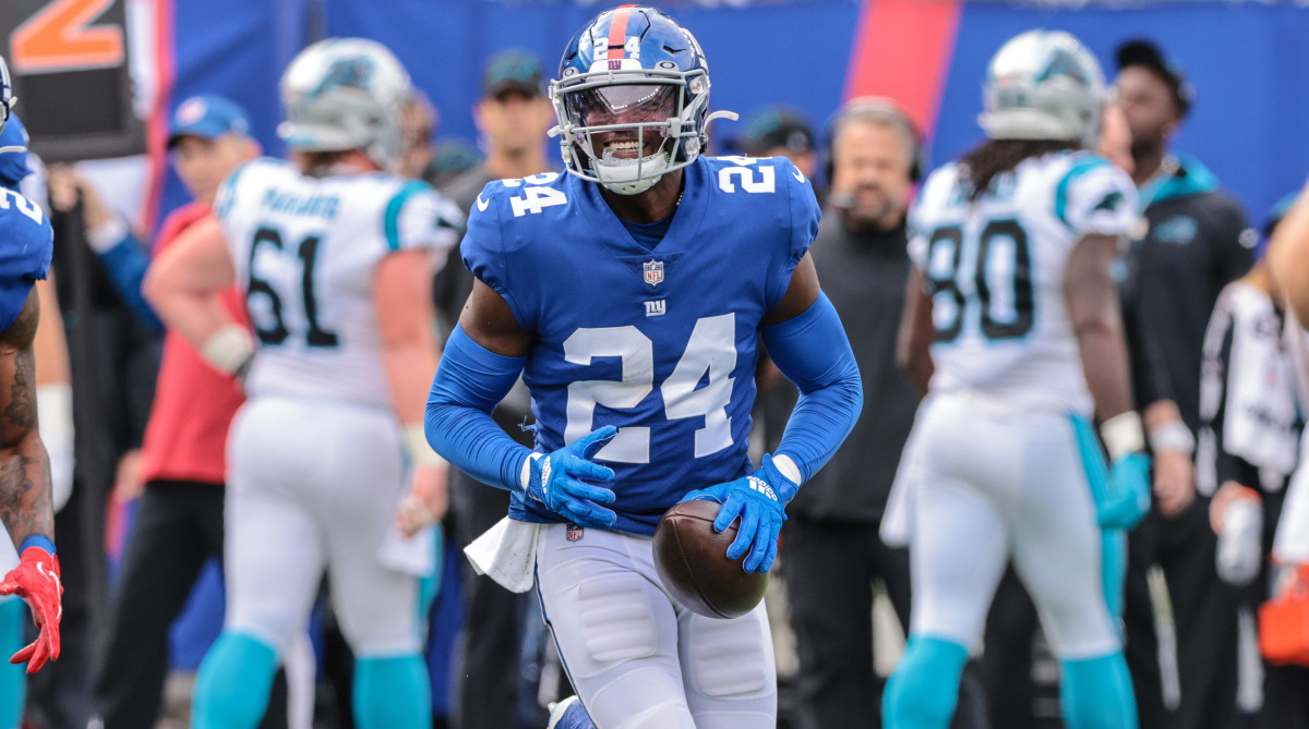 New York Giants cornerback James Bradberry (24) reacts after an interception against the Carolina Panthers during the first half at MetLife Stadium.