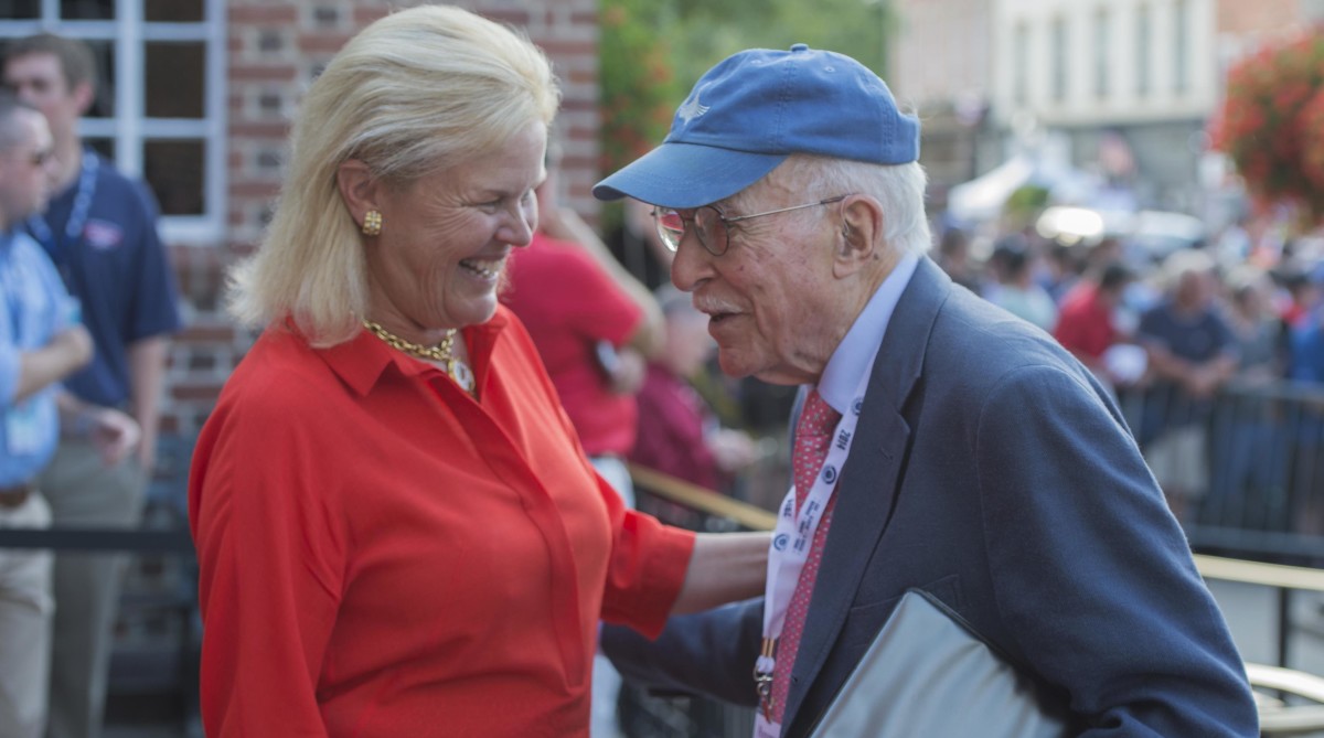 Roger Angell the J G Taylor Spink Award winner arrives and is greeted by Jane Forbes Clark at National Baseball Hall of Fame.