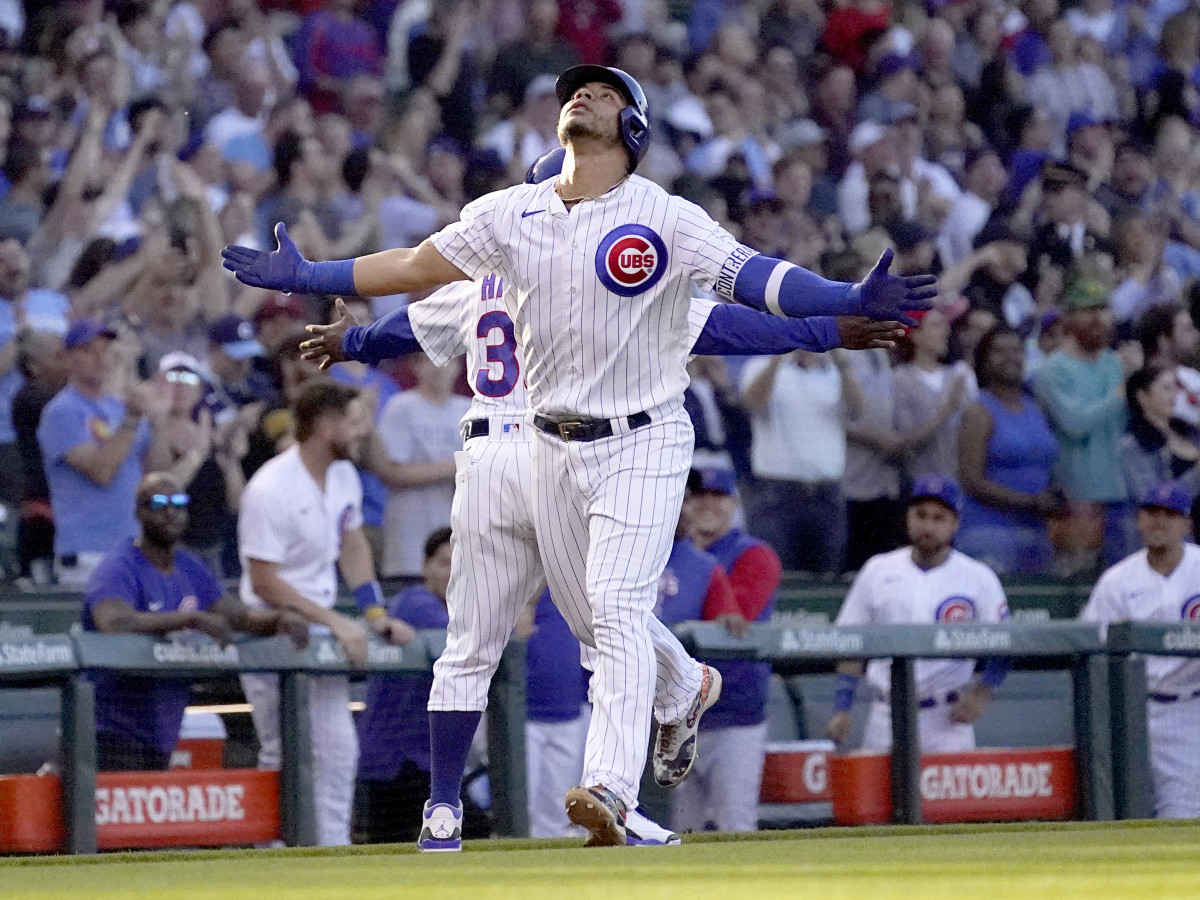 Chicago Cubs’ Willson Contreras celebrates his grand slam off Pittsburgh Pirates relief pitcher Bryse Wilson during the first inning of a baseball game Monday, May 16, 2022, in Chicago.