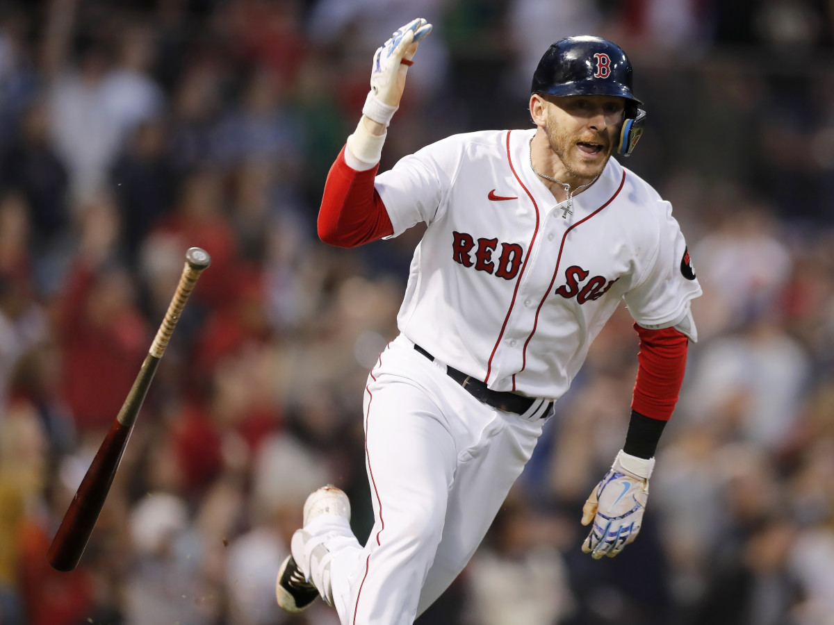 Boston Red Sox’s Trevor Story flips his bat after hitting a grand slam against the Seattle Mariners during the third inning of a baseball game Friday, May 20, 2022, in Boston.