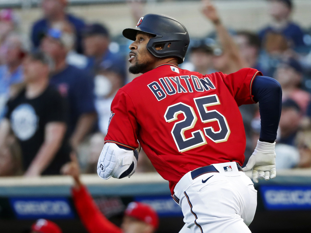 Minnesota Twins’ Byron Buxton runs the bases on his solo home run against the Cleveland Guardians during the first inning of a baseball game Friday, May 13, 2022, in Minneapolis.