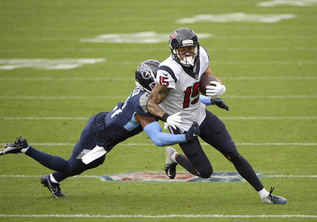 Oct 18, 2020; Nashville, Tennessee, USA; Tennessee Titans free safety Kevin Byard (31) tackles Houston Texans wide receiver Will Fuller (15) during the first quarter at Nissan Stadium. Mandatory Credit: Steve Roberts-USA TODAY Sports