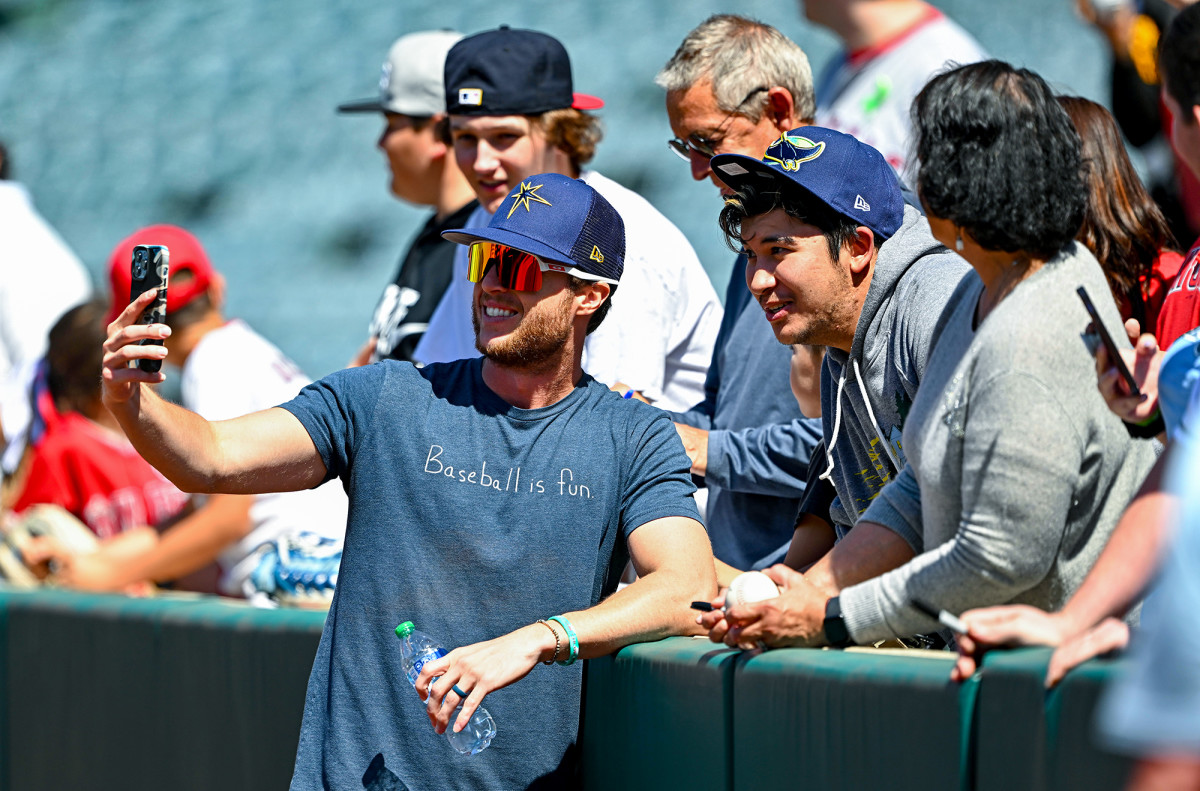 Brett Phillips has fun in first pitching appearance