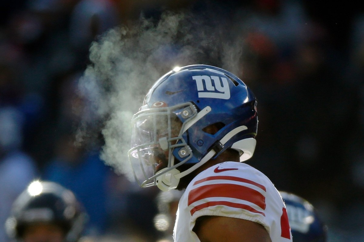 Jan 2, 2022; Chicago, Illinois, USA; The breath of New York Giants cornerback Julian Love (20) is visible in the cold air between plays against the Chicago Bears during the first half at Soldier Field.