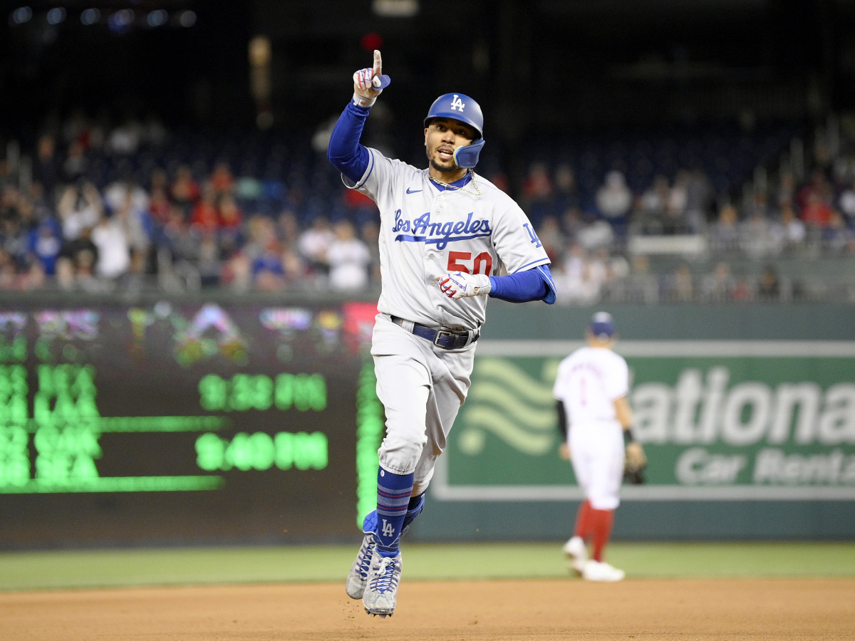 Los Angeles Dodgers’ Mookie Betts celebrates his home run during the fourth inning of a baseball game against the Washington Nationals, Tuesday, May 24, 2022, in Washington.