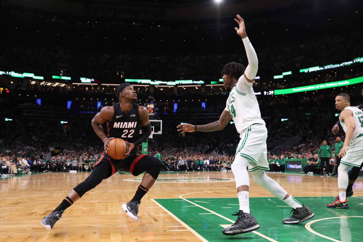 May 23, 2022; Boston, Massachusetts, USA; Miami Heat forward Jimmy Butler (22) looks to the basket defended by Boston Celtics center Robert Williams III (44) in the first half during game four of the 2022 eastern conference finals at TD Garden.