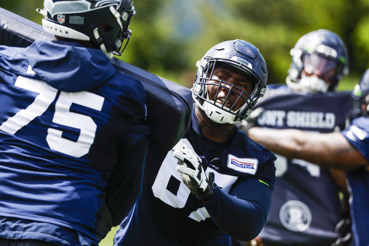 Seattle Seahawks offensive lineman Charles Cross (67) participates in an OTA workout at the Virginia Mason Athletic Center.