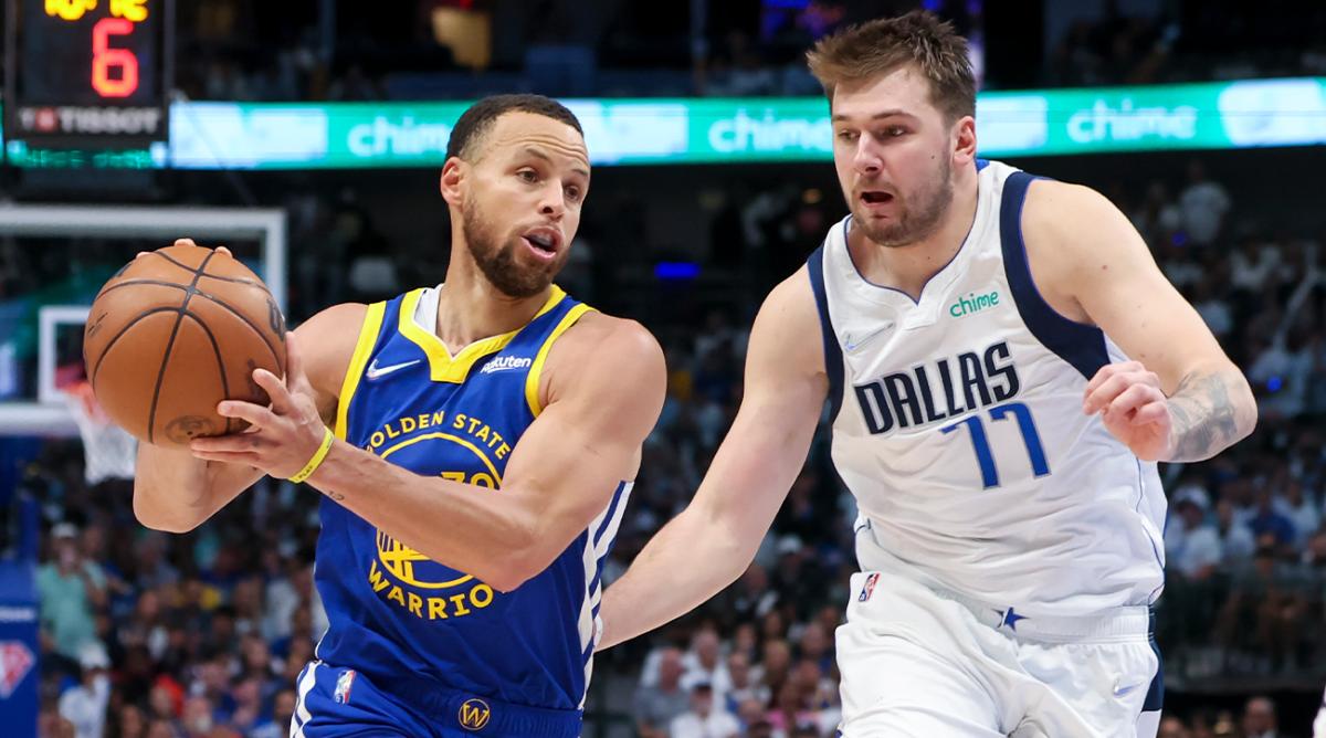 May 24, 2022; Dallas, Texas, USA; Golden State Warriors guard Stephen Curry (30) in action against Dallas Mavericks guard Luka Doncic (77) during game four of the 2022 Western Conference finals at American Airlines Center.