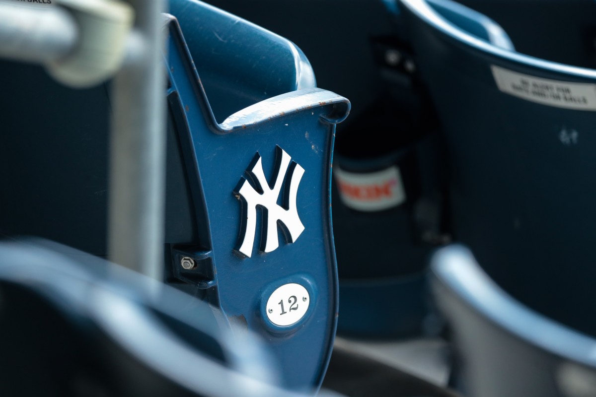New York Yankees logo on seat at Yankee Stadium
