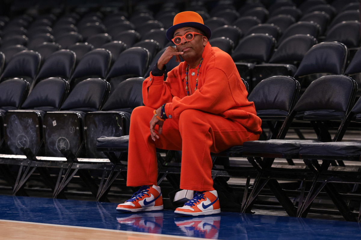 American actor and director Spike Lee looks up during warmups before a game between the New York Knicks and the Golden State Warriors at Madison Square Garden.