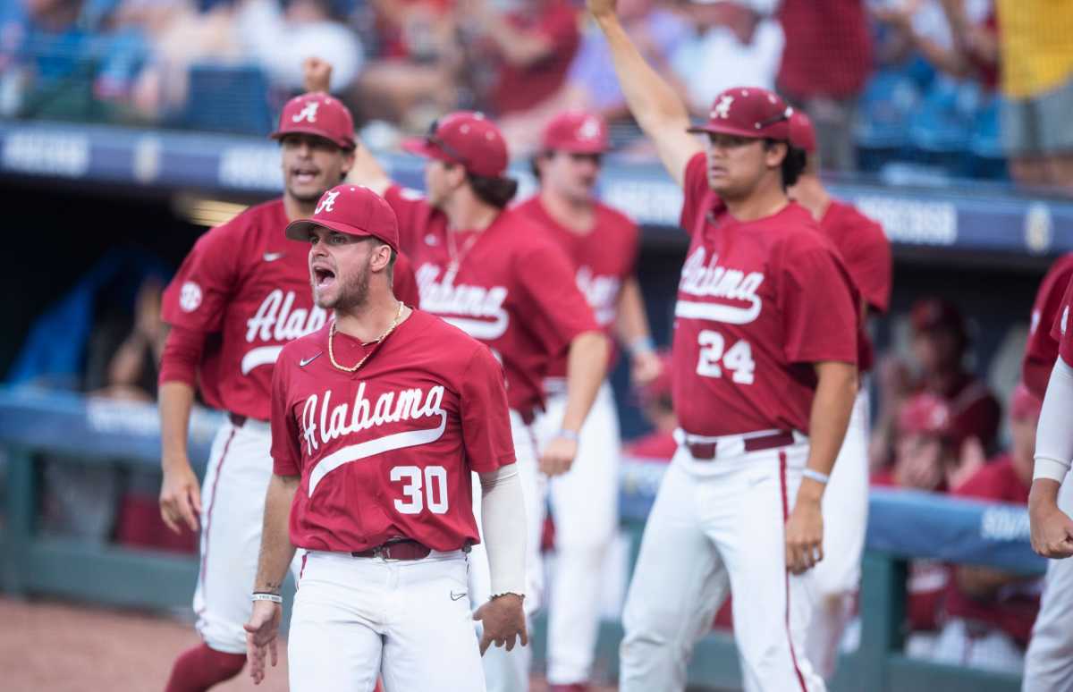 Alabama dugout reacts to a run scored as Alabama Crimson Tide takes on Texas A&M Aggies during the SEC baseball tournament at the Hoover Metropolitan Stadium in Hoover, Ala., on Friday, May 27, 2022.