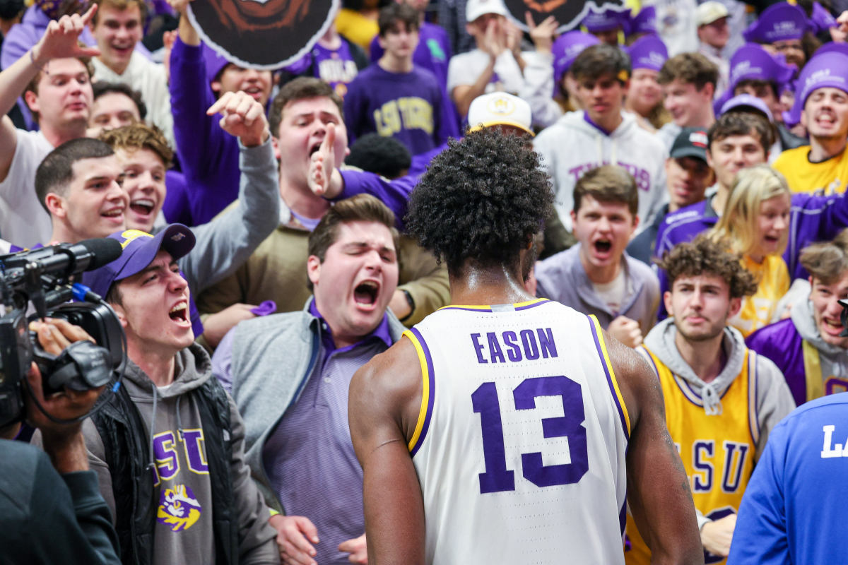 LSU Tigers fans celebrate a win with forward Tari Eason (13) after the game against the Kentucky Wildcats at the Pete Maravich Assembly Center.