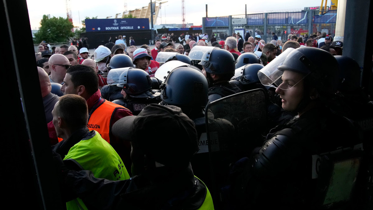 Police clash with fans at the Champions League final