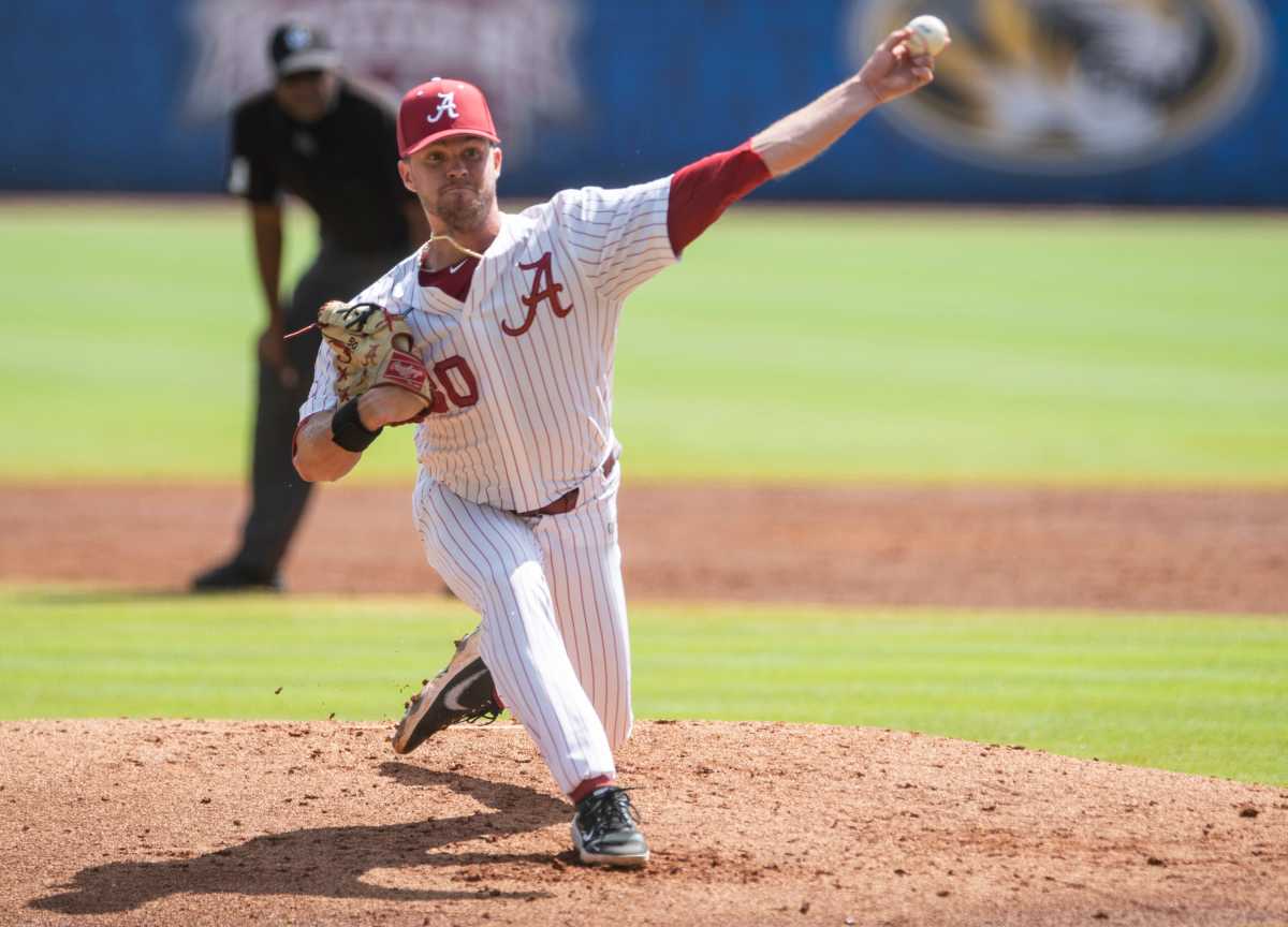 Alabama pitcher Jake Leger (30) pitches as Alabama Crimson Tide take on Florida Gators during the SEC baseball tournament at the Hoover Metropolitan Stadium in Hoover, Ala., on Saturday, May 28, 2022.
