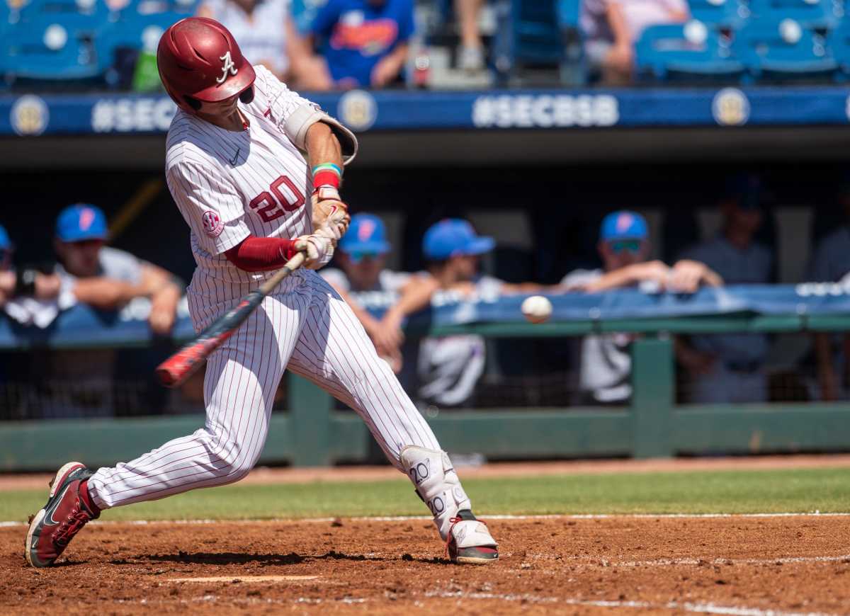 Alabama outfielder Tommy Seidl (20) swings at the ball as Alabama Crimson Tide take on Florida Gators during the SEC baseball tournament at the Hoover Metropolitan Stadium in Hoover, Ala., on Saturday, May 28, 2022.