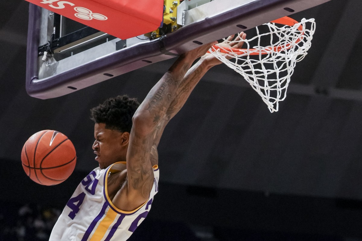 Feb 26, 2022; Baton Rouge, Louisiana, USA; LSU Tigers forward Shareef O'Neal (24) dunks the ball against the Missouri Tigers during the first half at the Pete Maravich Assembly Center. Mandatory Credit: Stephen Lew-USA TODAY Sports
