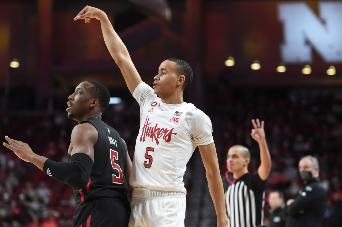 Nebraska Cornhuskers guard Bryce McGowens (5) scores on a three point basket against Rutgers Scarlet Knights forward Aundre Hyatt (5) in the first half at Pinnacle Bank Arena.