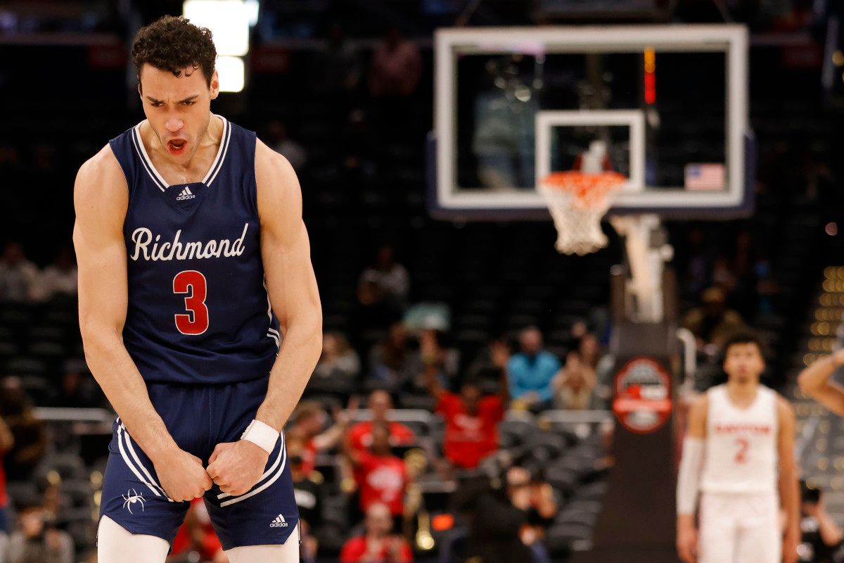 Richmond Spiders forward Tyler Burton (3) celebrates in the final minute against the Dayton Flyers in the second half at Capital One Arena.