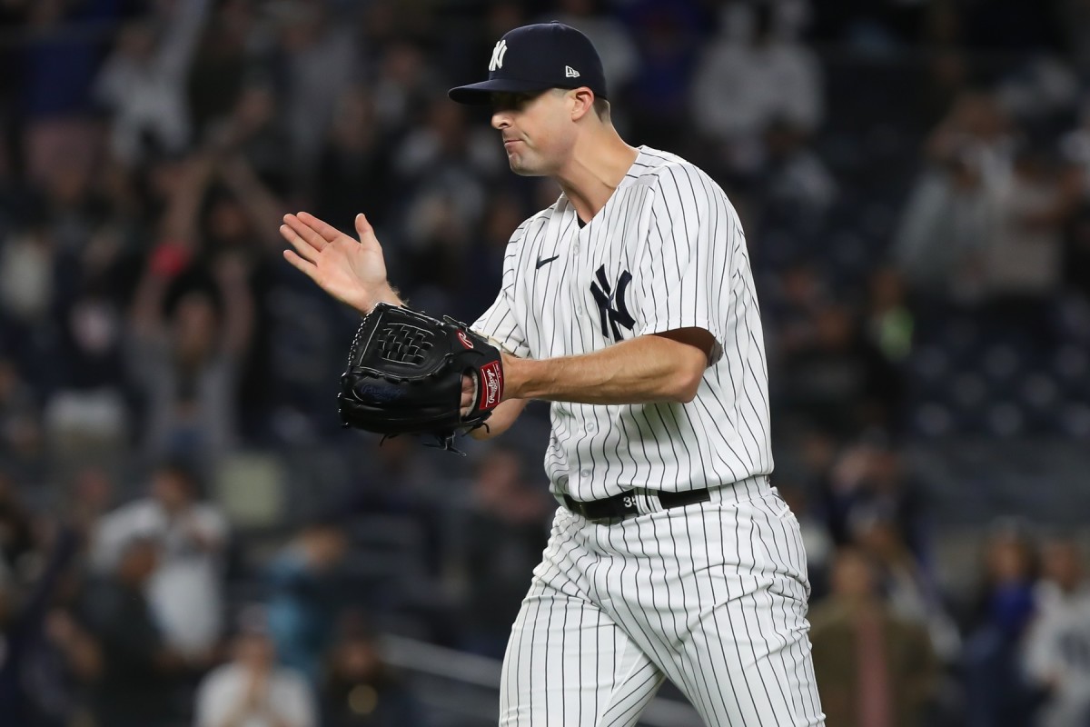 New York Yankees closer Clay Holmes claps after strikeout