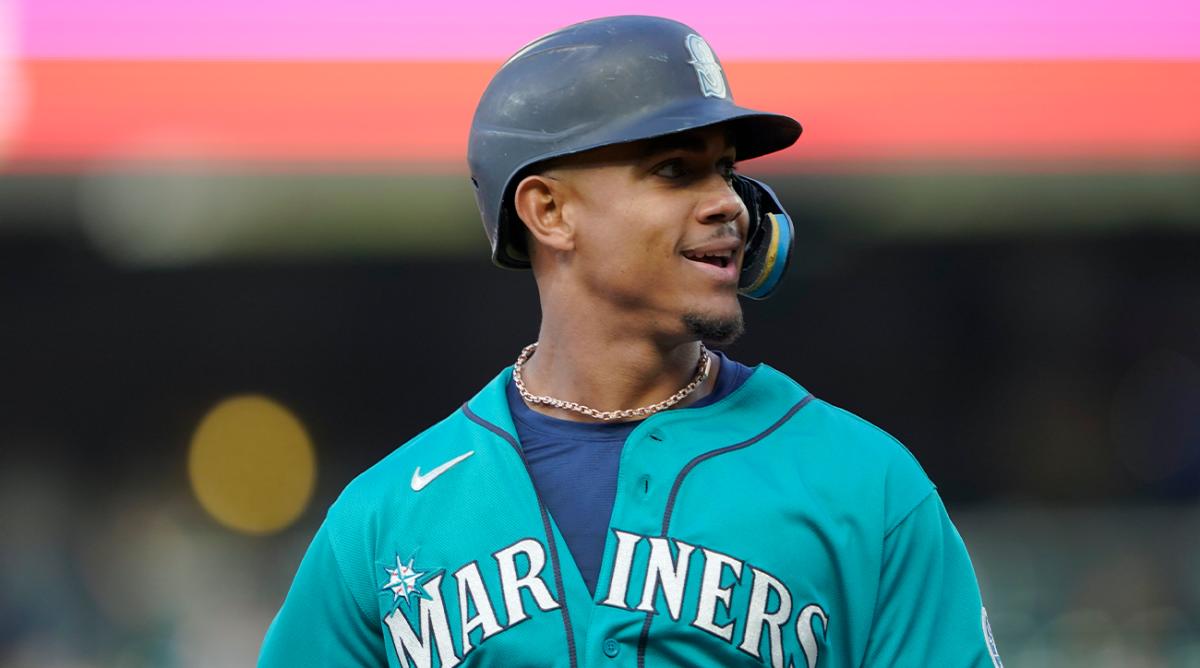 Seattle Mariners’ Julio Rodriguez smiles after he hit a two-run home run against the Houston Astros during the first inning of a baseball game Friday, May 27, 2022, in Seattle.