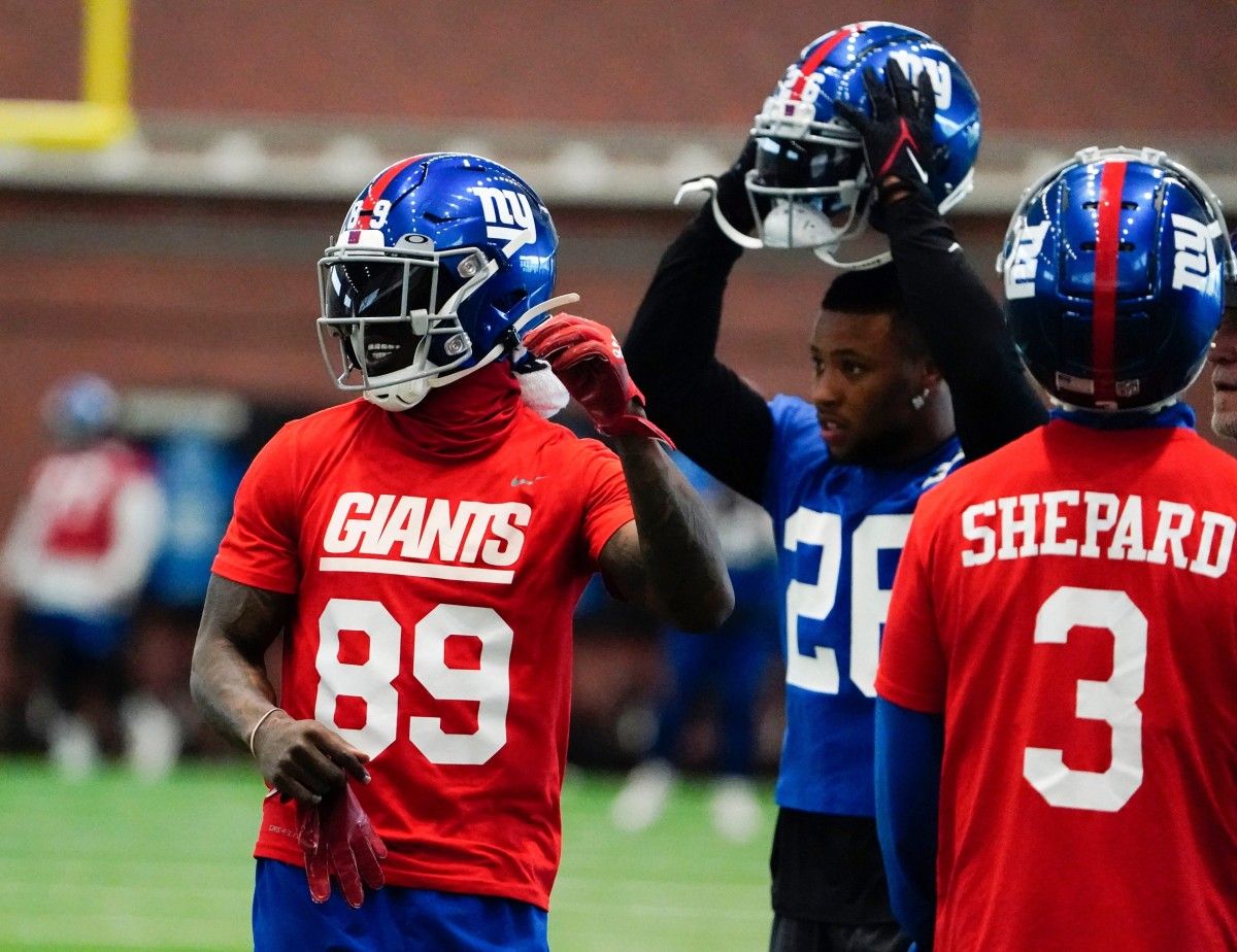 (from left) New York Giants wide receiver Kadarius Toney, running back Saquon Barkley and wide receiver Sterling Shepard on the field for organized team activities (OTAs) at the training center in East Rutherford on Thursday, May 19, 2022.
