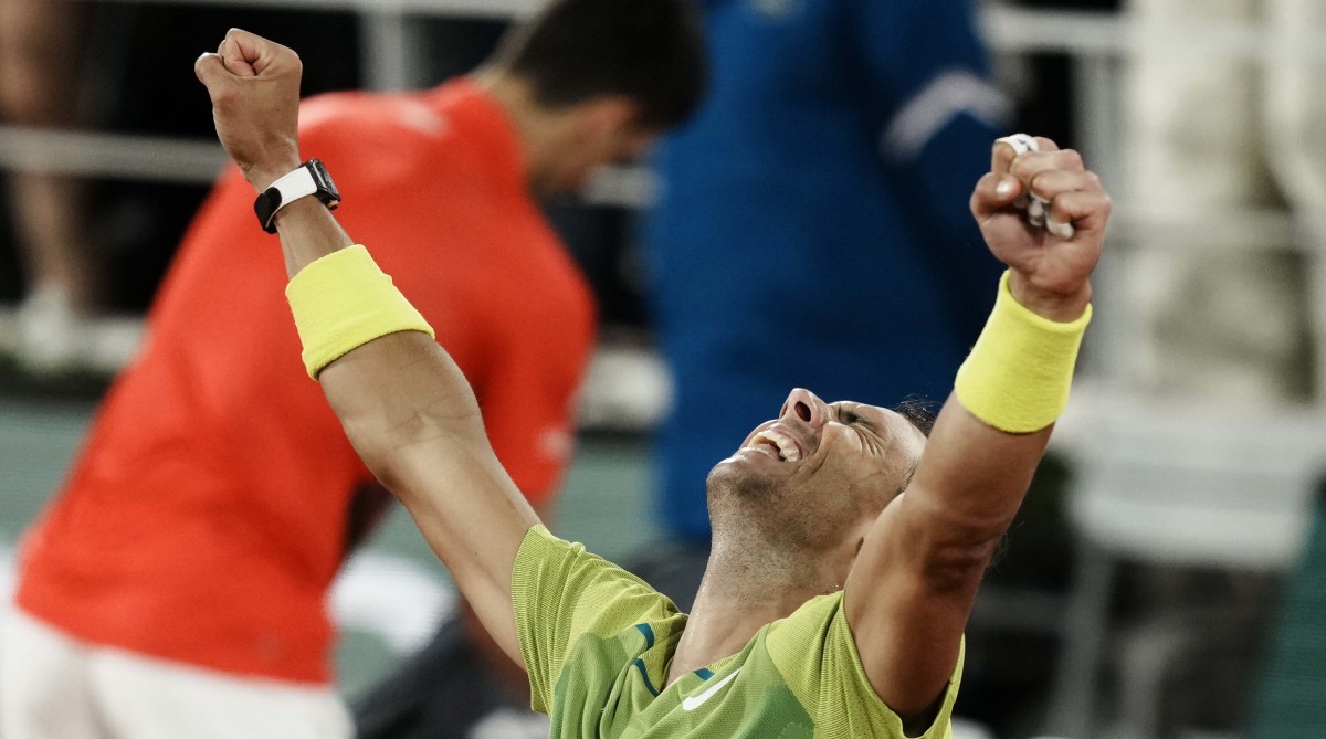 Rafael Nadal celebrates after beating Novak Djokovic at the French Open.