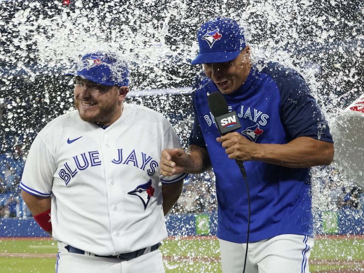 Kirk's pinch-hit double and 3 homers by Toronto power the Blue Jays past  the Rockies 13-9