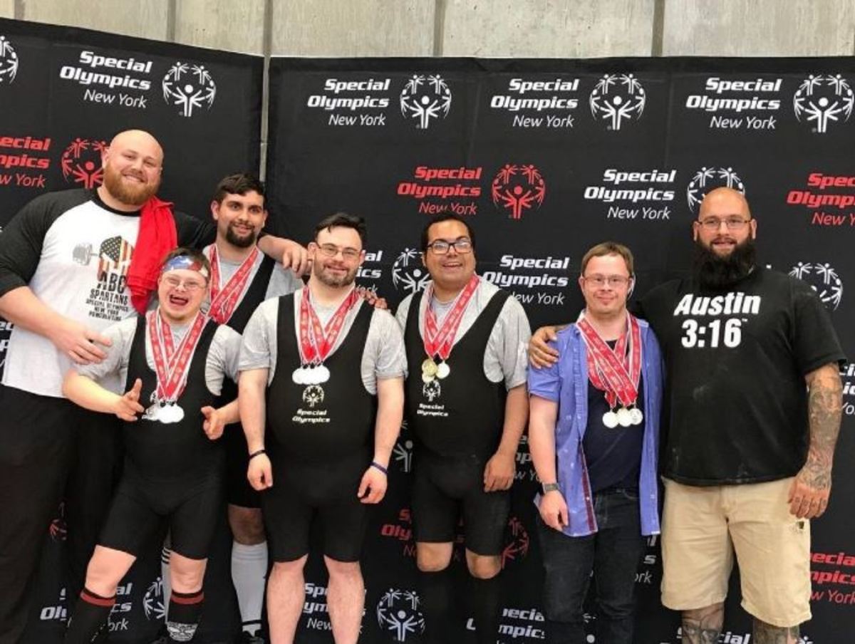 Special Olympics athletes after a weightlifting competition